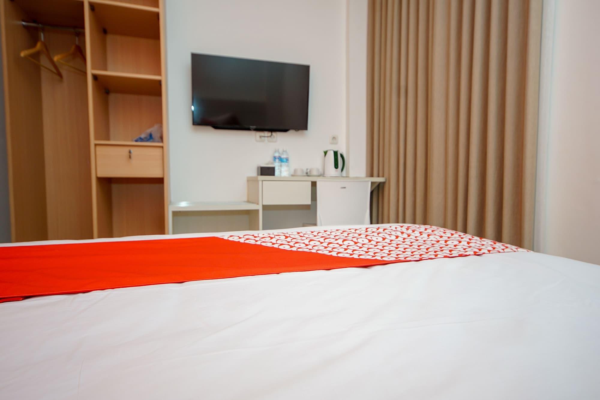 Oyo 344 Kr Hotel 巨港 外观 照片