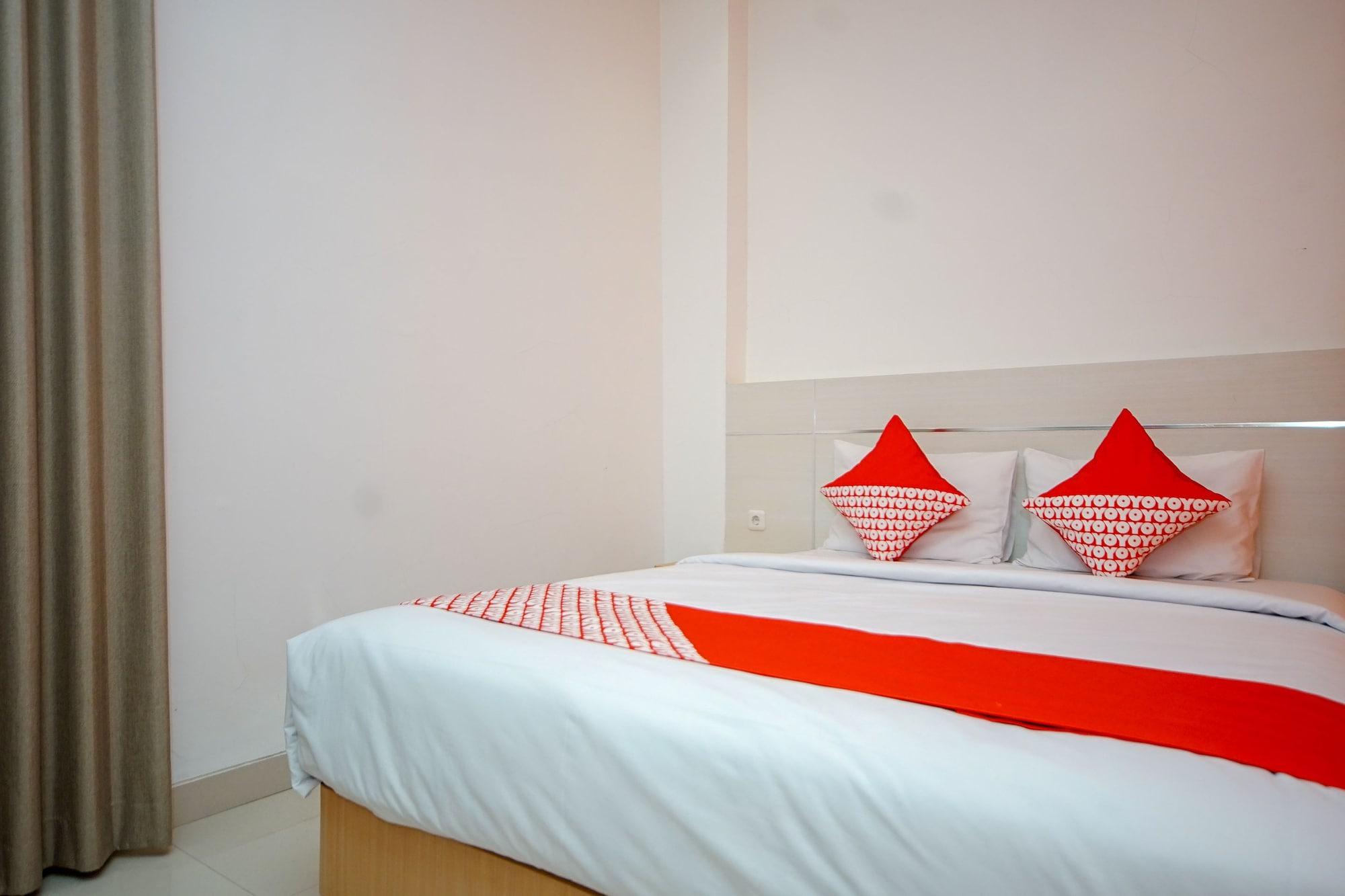 Oyo 344 Kr Hotel 巨港 外观 照片