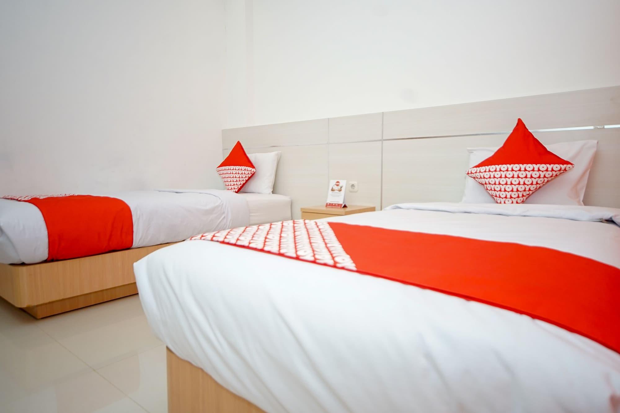 Oyo 344 Kr Hotel 巨港 外观 照片