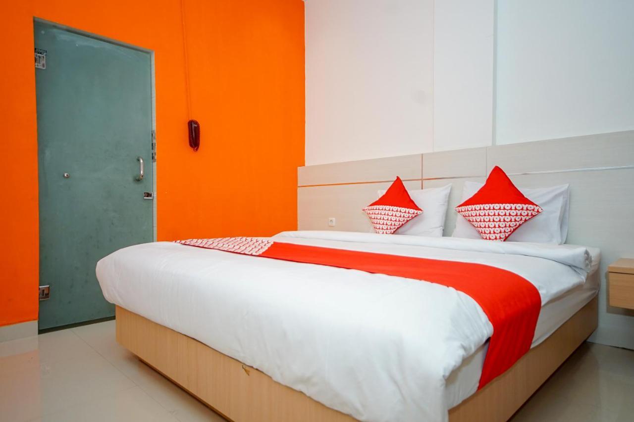 Oyo 344 Kr Hotel 巨港 外观 照片